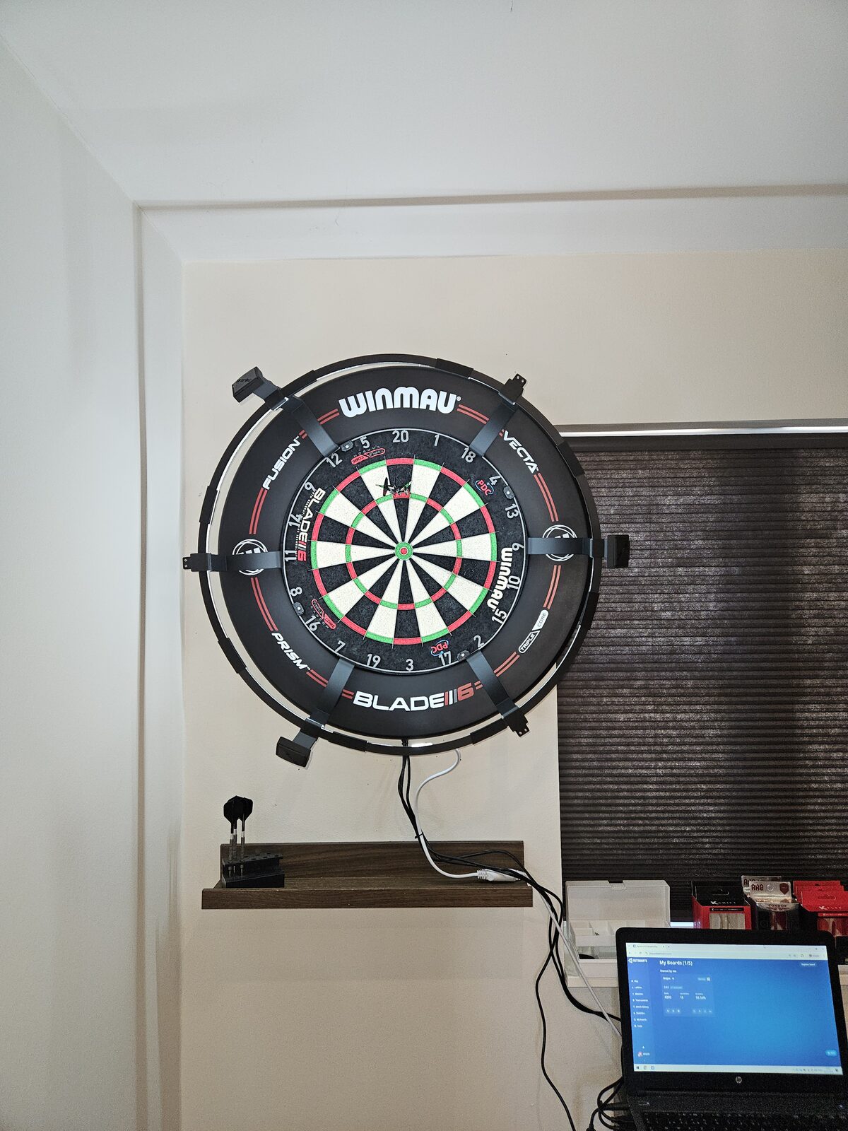 Winmau Blade 6 board with the LED ring and arms mounted, ready to play