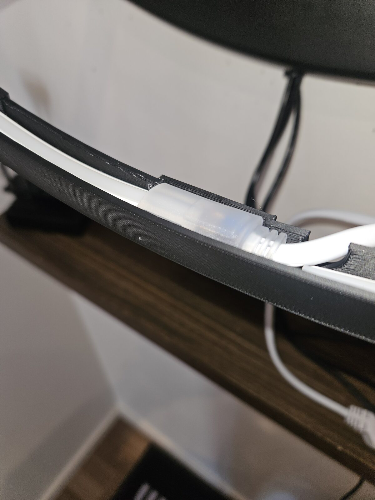 Wide view of the LED ring lit up around the camera arm